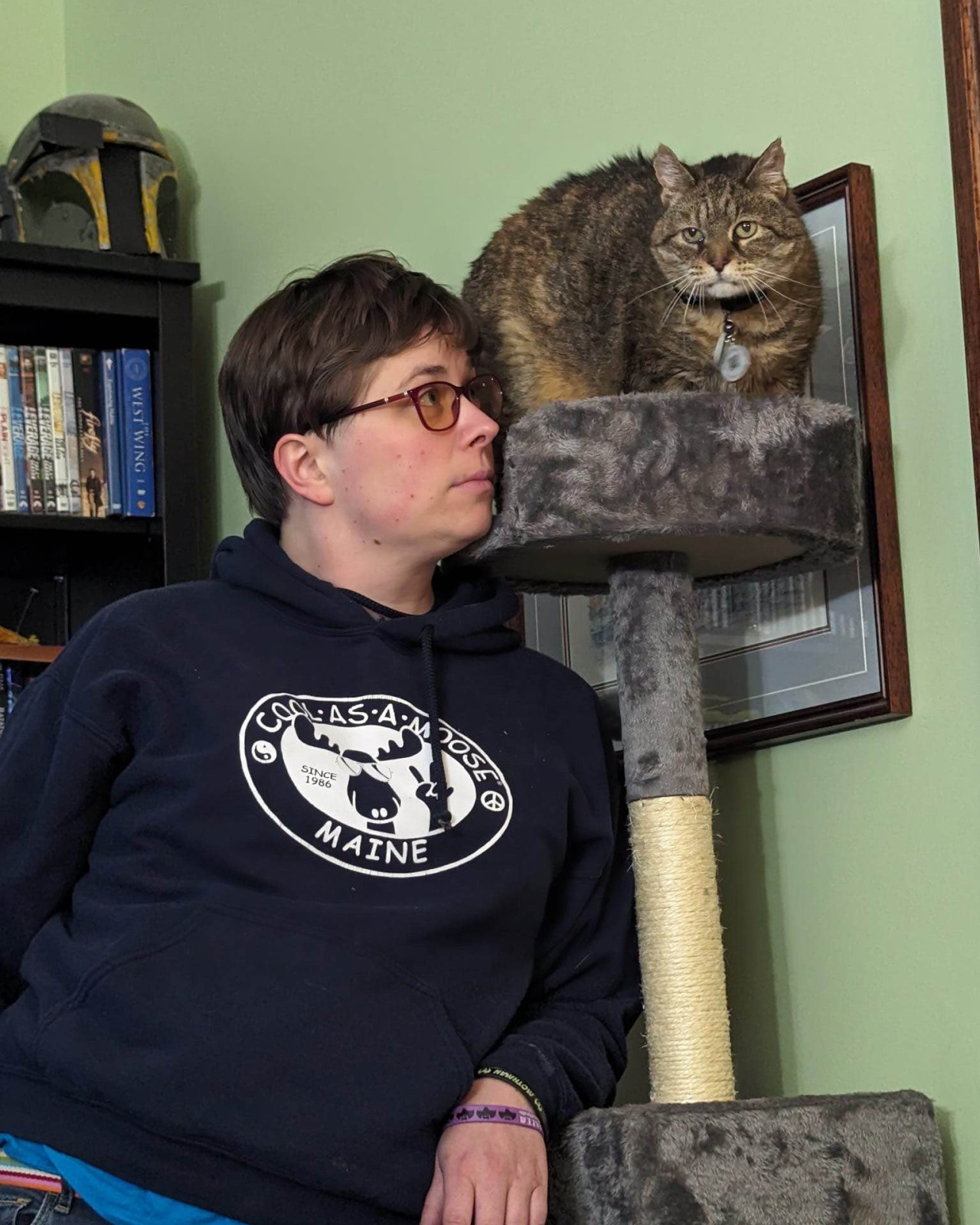 Casey posing with her cat.