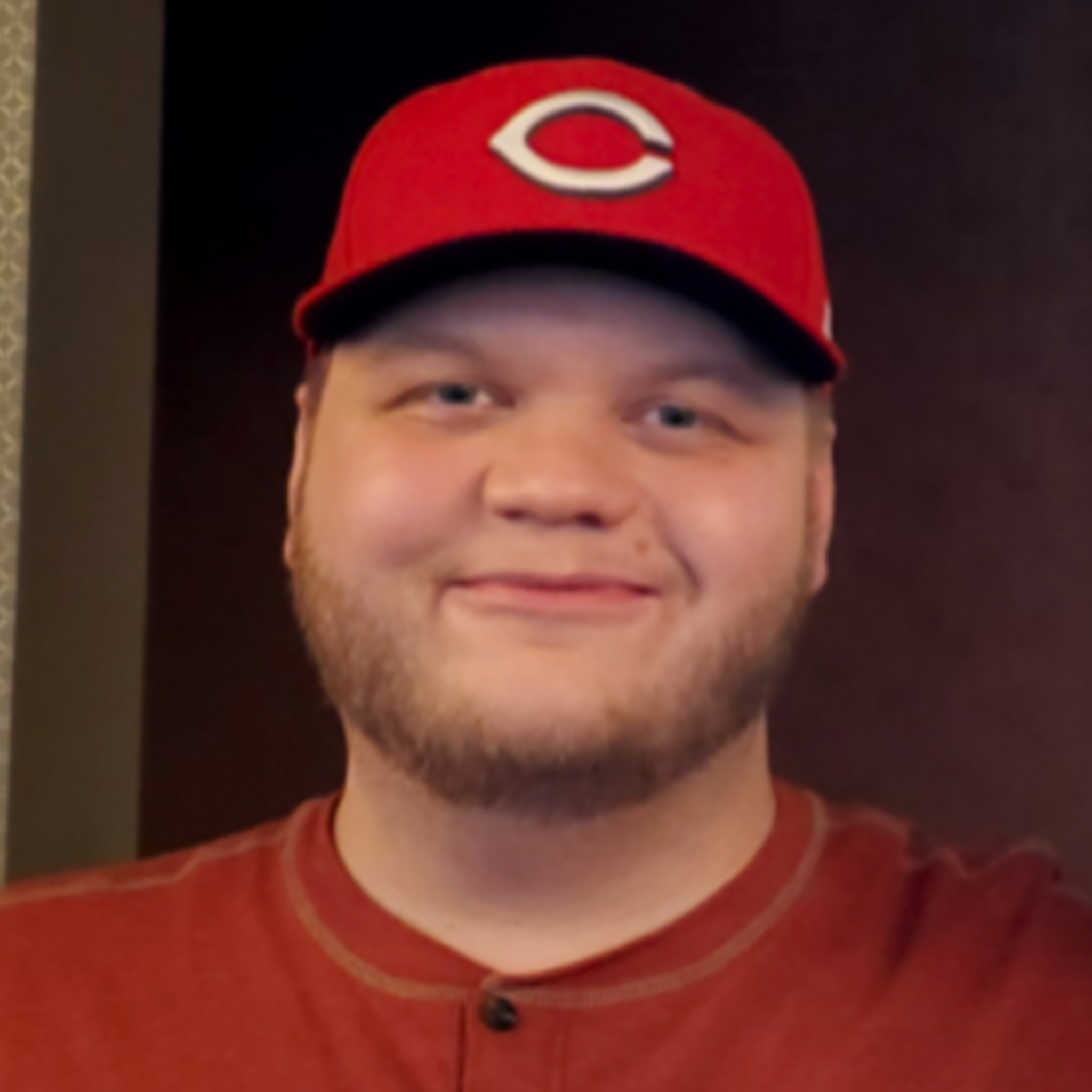 Joseph wearing a red Chicago Bears hat.