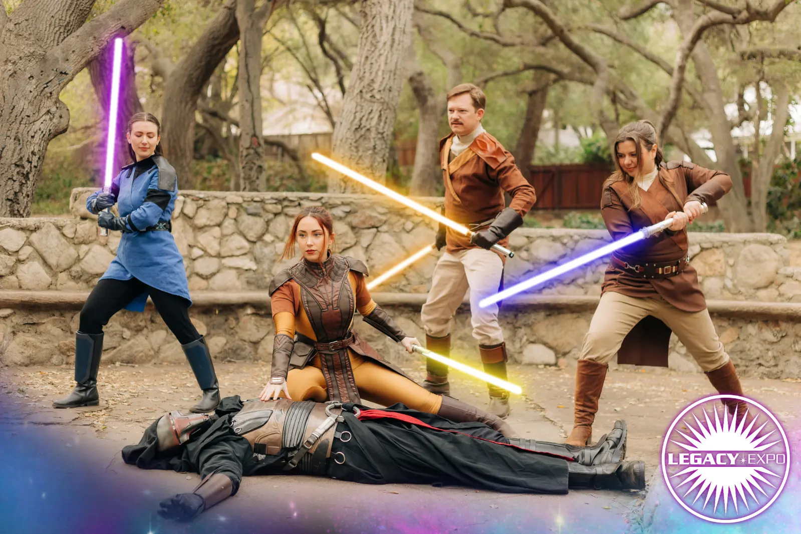 Cosplayers dressed as Old Republic jedi, with a defeated Darth Revan on the ground.