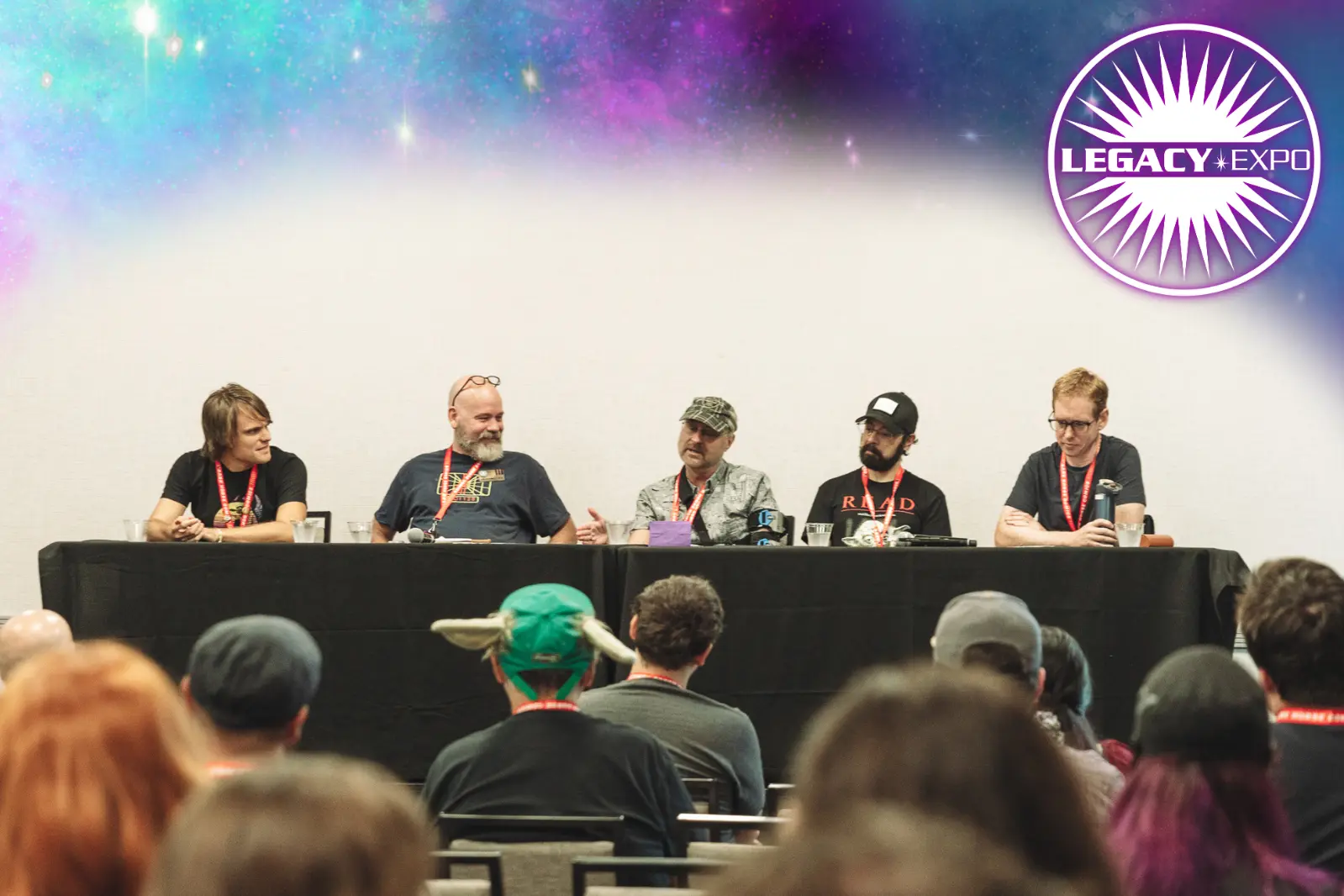 A panel of Star Wars authors Jason Fry, Henry Gilroy, Abel Peña, and Michael Kogge, moderated by a fan. 